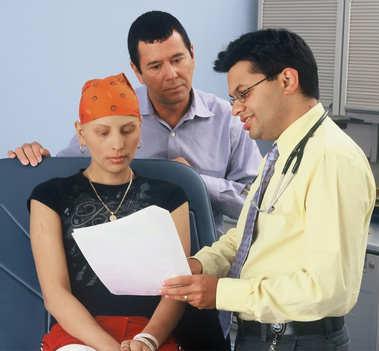 Doctor and patient communicating through a secure telehealth session